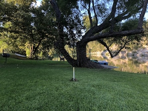 Horseshoes, charcoal pit, long view of riverfront with manicured St. Augustine