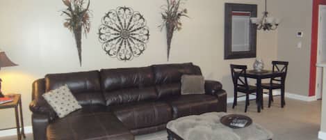 Leather sofa with end recliner and reclining chaise lounge
