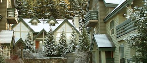 Snowgoose is nestled in the trees at the foot of Blackcomb Mountain. 