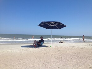 Umbrella, chairs and beach toys at the condo 