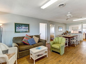 Looking from front door toward dining area and kitchen