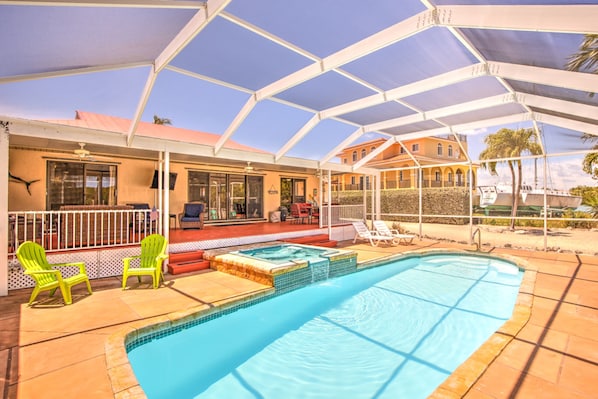 Private screened in porch and pool area