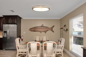 Living room area with our famous Tarpon Run carving