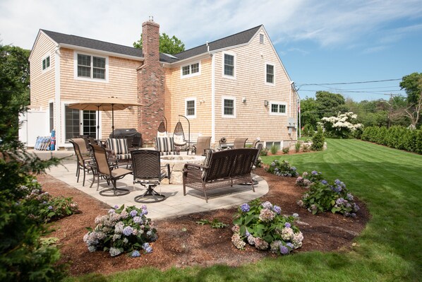 back of house with large patio & firepit & grill