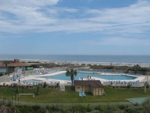 Main pool at the resort with shaded area 