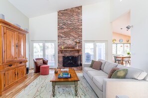 Enjoy the fireplace in the cooler months. Sliding doors leads to large deck.