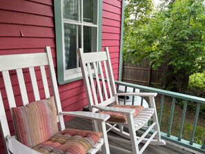 Kitchen porch has views of back garden.