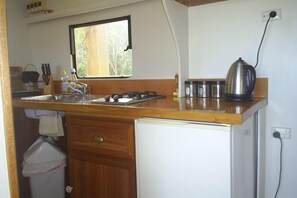 Kitchen - bar fridge suitable for weekend stays - bring a chilly bin for longer.