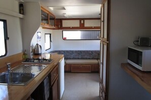 Kitchen/Lounge/Breakfast bar opposite. Loads of storage