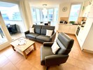 Feines Echtledersofa mit Schwung-Drehsessel 