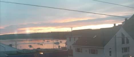 Damariscotta Harbor view from living room and front bedroom. Beautiful sunsets.