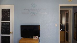 Bedroom 1 TV, Dresser & Closet to the left
