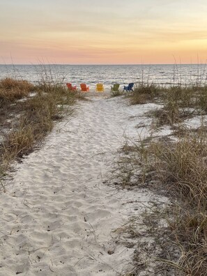 Direct path from the back yard to your own private beach.