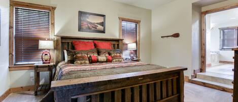 Main Level Master bedroom with king size bed and large tub!