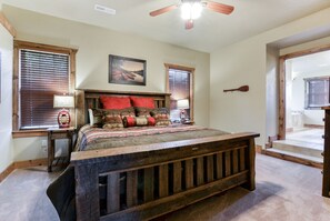 Main Level Master bedroom with king size bed and large tub!