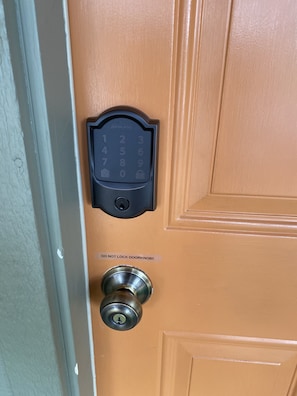 Front door keyless entry access - super simple with your designated code!