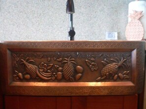 CUSTOM-MADE COPPER SINKS IN KITCHEN AND BATHROOM