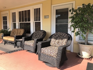 New porch furniture has thick cushions, and includes rockers and swivel love sea