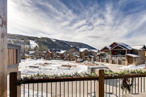 View to the West toward the Mountain Base. Can see skiers on the Haywood Run.