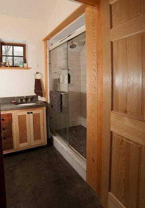 Master bath shower with double heads and body sprays.