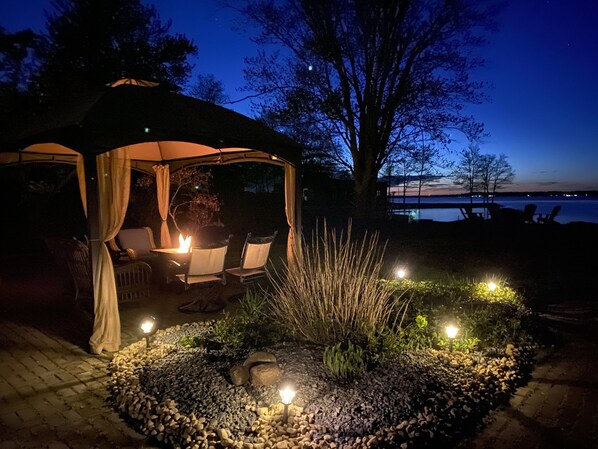 Cozy gazebo with gas fire pit
