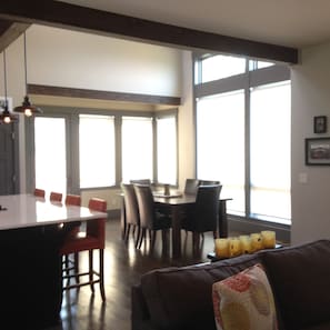 Looking into dining room/kitchen island from living room.
