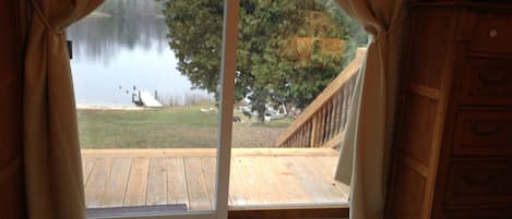 Watch the lake from bed or your private deck with a cappuccino or beer