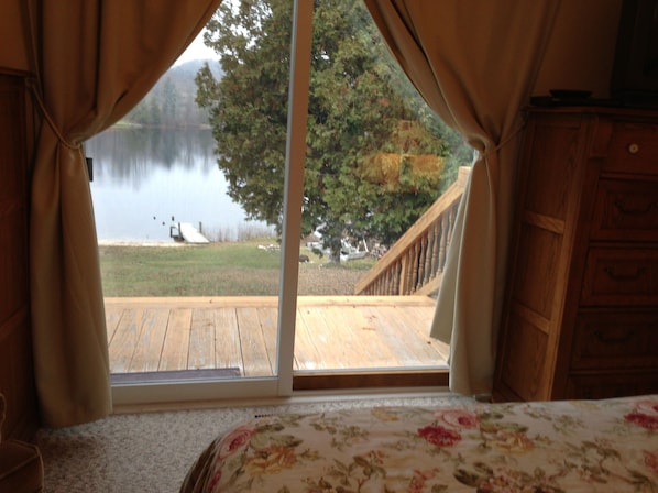 Watch the lake from bed or your private deck with a cappuccino or beer
