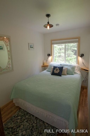 Cozy downstairs bedroom with queen bed