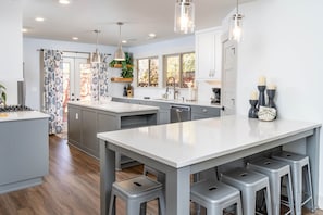 Large renovated kitchen with direct access to back patio & the Deschutes River!