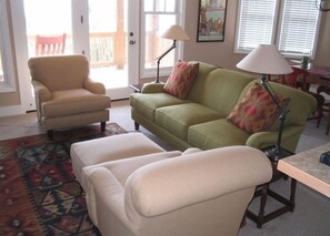 Living area with doors to Covered Balcony