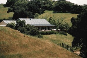ranch house with oversized lounge chairs to take in thespectacular ocean view!