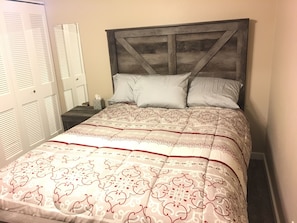 Bedroom with brand new queen bed.