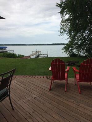 View from living room out to the patio and lake