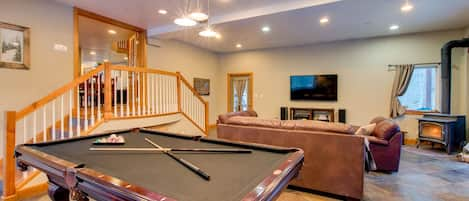 Stairs lead up to dining room and kitchen