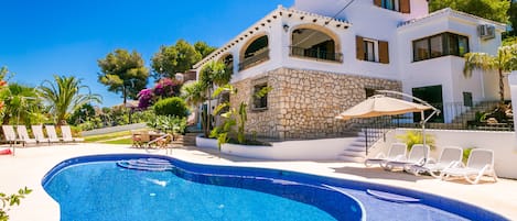 View of pool and villa. The play area in pool allows small kids to play.