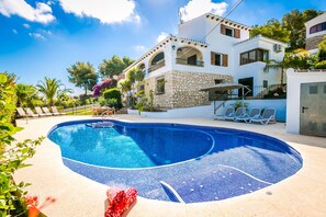Another view of the pool (with the spa area) and villa