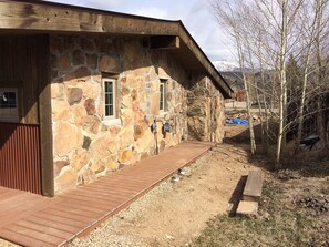 Original stone siding from the 1930’s with insulating foam added w/remodel