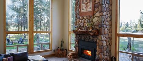 The greatroom features a wood-burning stove