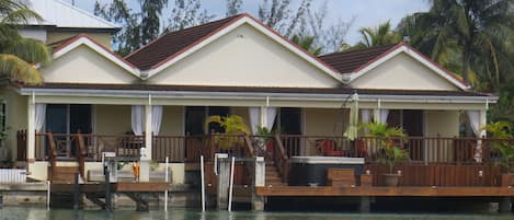 Waterside of the Villa with Veranda and split level decks overlooking the water