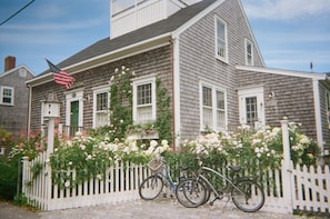 Front of in-town property, ~3 minutes by bike or a ~10-min. walk to Main St.
