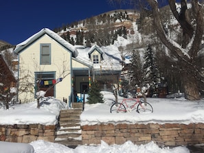 The Blue House is on the sunny side of the street where you can winter sunbath