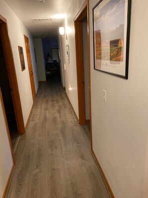 Hallway to living area and bedrooms