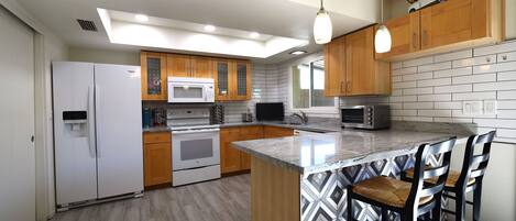 Beautiful kitchen - great seating to for morning coffee and planning the day!