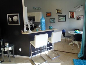 Breakfast bar with new white leather stools
