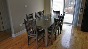 Dining table with seating for 8 people (extra folding chairs available)