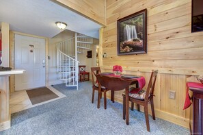 4 Chairs are provided for the dining table that has drop down sides