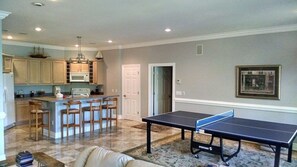 Enjoy a game of ping pong, on the second level. 
