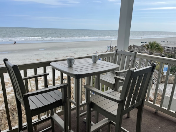 Balcony with excellent view of beach. Great place for mourning coffee. 