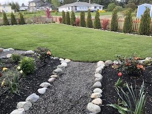 Beautifully landscaped and fenced yard! Lawn games provided!